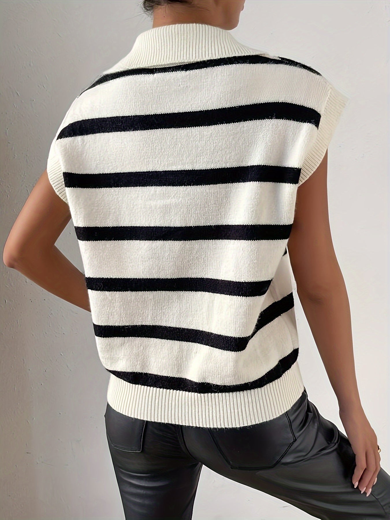 Sleeveless sweater with stripes